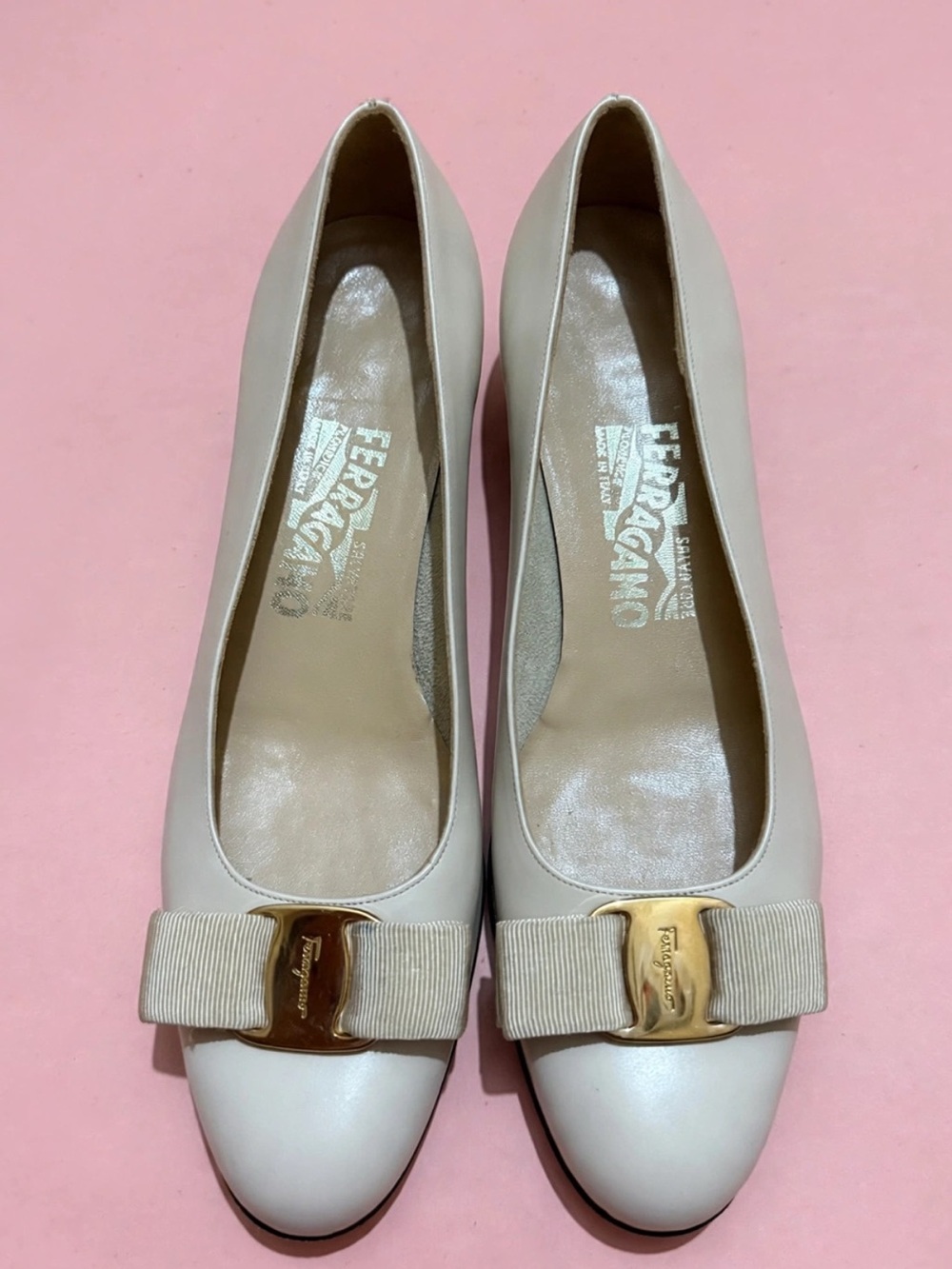 Salvatore Ferragamo Cream Leather Bow Pumps with Gold Plaque